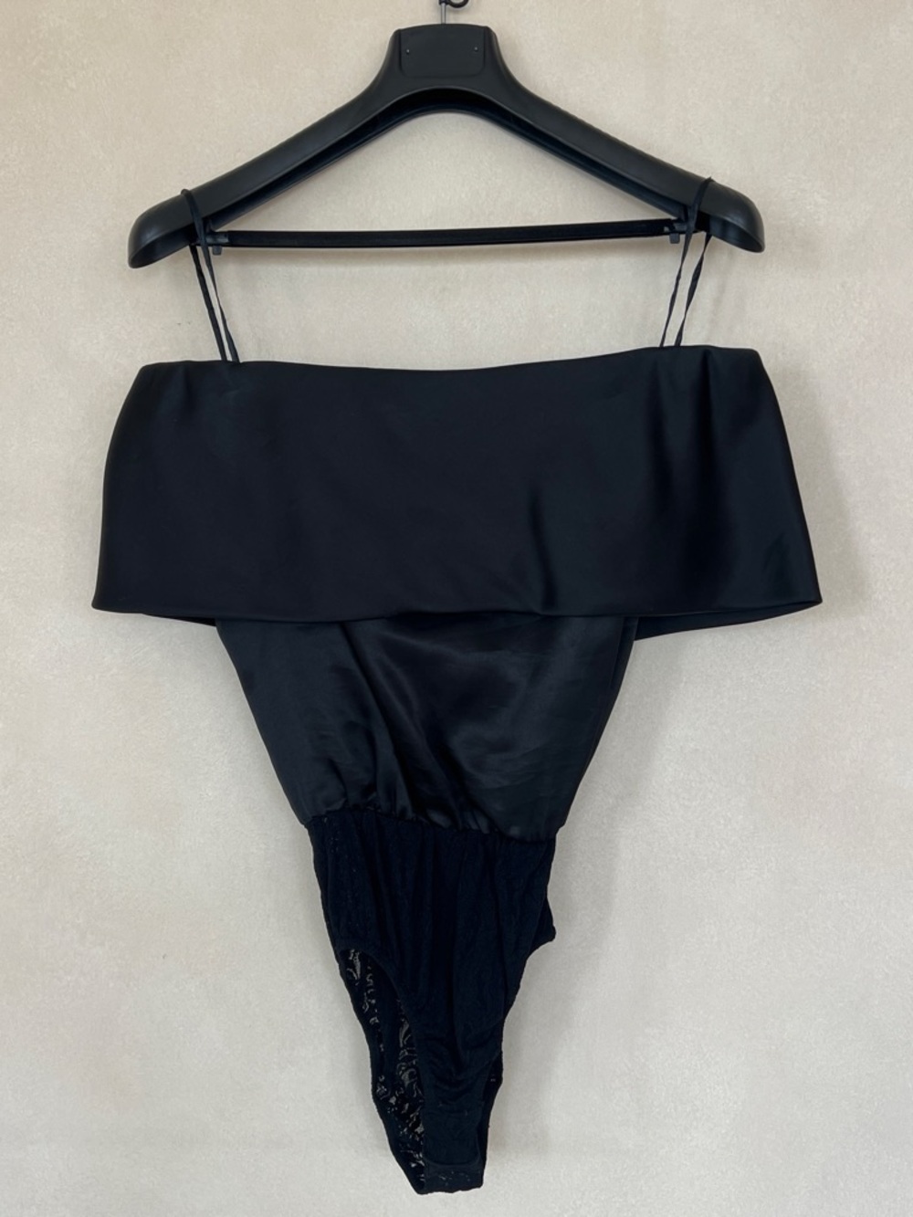 Black off the shoulder bodysuit with lace trim bottom fit small-medium